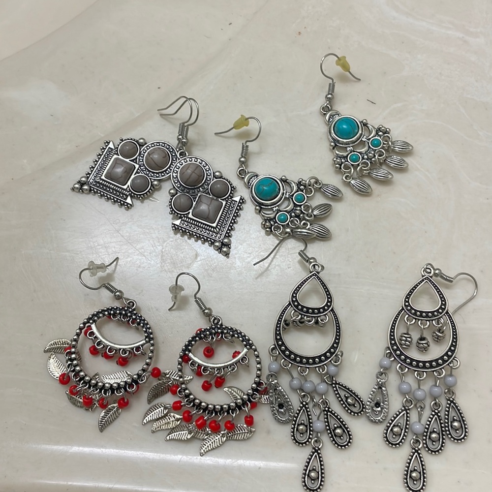 Four sets of earrings